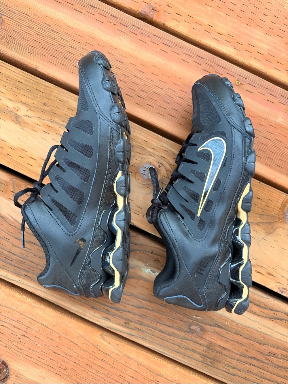 Nike Men’s Reax 8 TR Black Athletic Shoes with Gold Swoosh